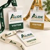 Illustrative Alide-branded visitor and event badge set